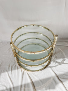 VINTAGE BRASS AND GLASS 4 TIER SWIVEL TABLE