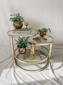 VINTAGE BRASS AND GLASS 4 TIER SWIVEL TABLE