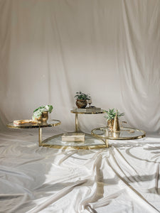 VINTAGE BRASS AND GLASS 4 TIER SWIVEL COFFEE TABLE