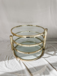 VINTAGE BRASS AND GLASS 4 TIER SWIVEL TABLE